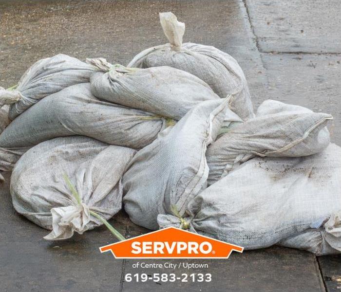 Sandbags are collected in advance of a severe rainstorm.